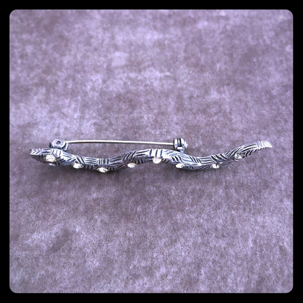 Silver snake pin with stones